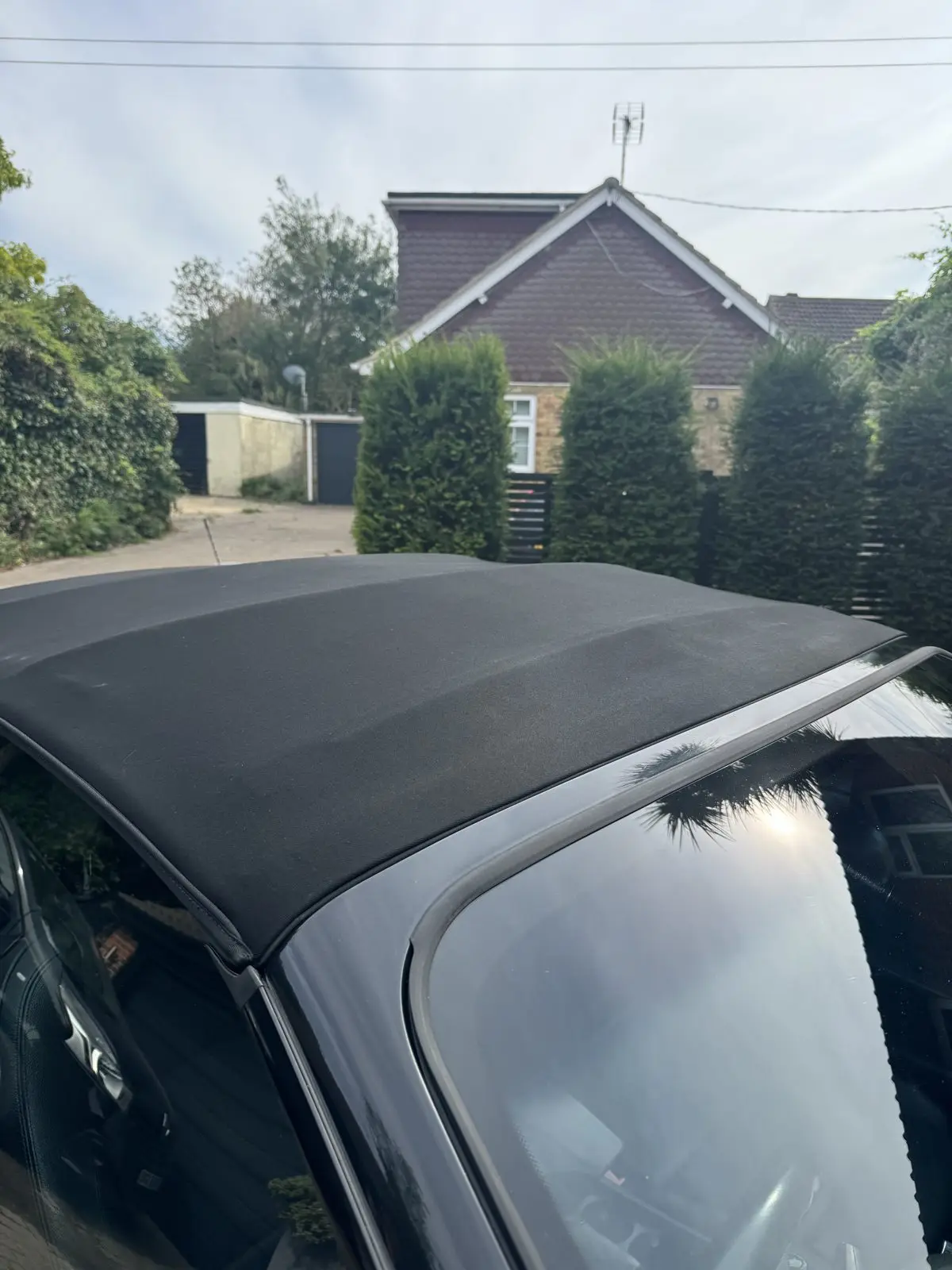 The same cabriolet roof after a specialist clean and protective treatment