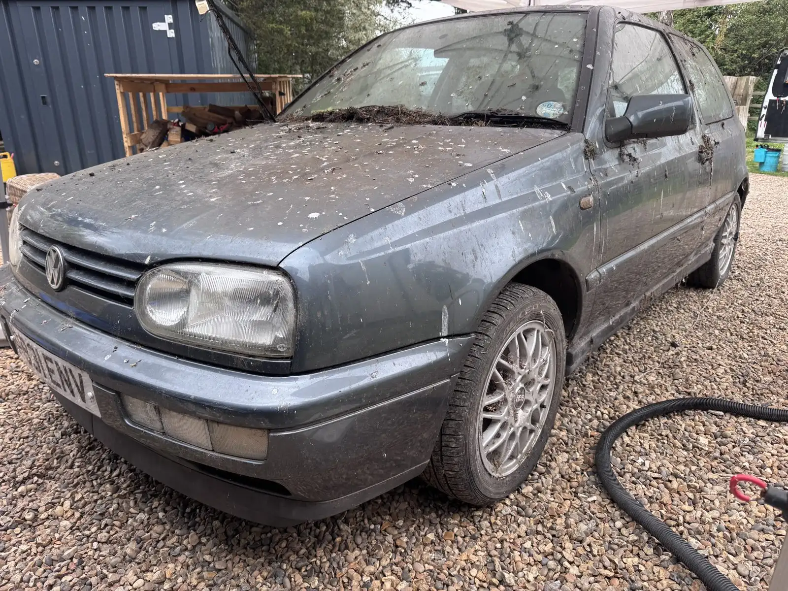 Grey VW Golf before a full valet, paint dull and contaminated