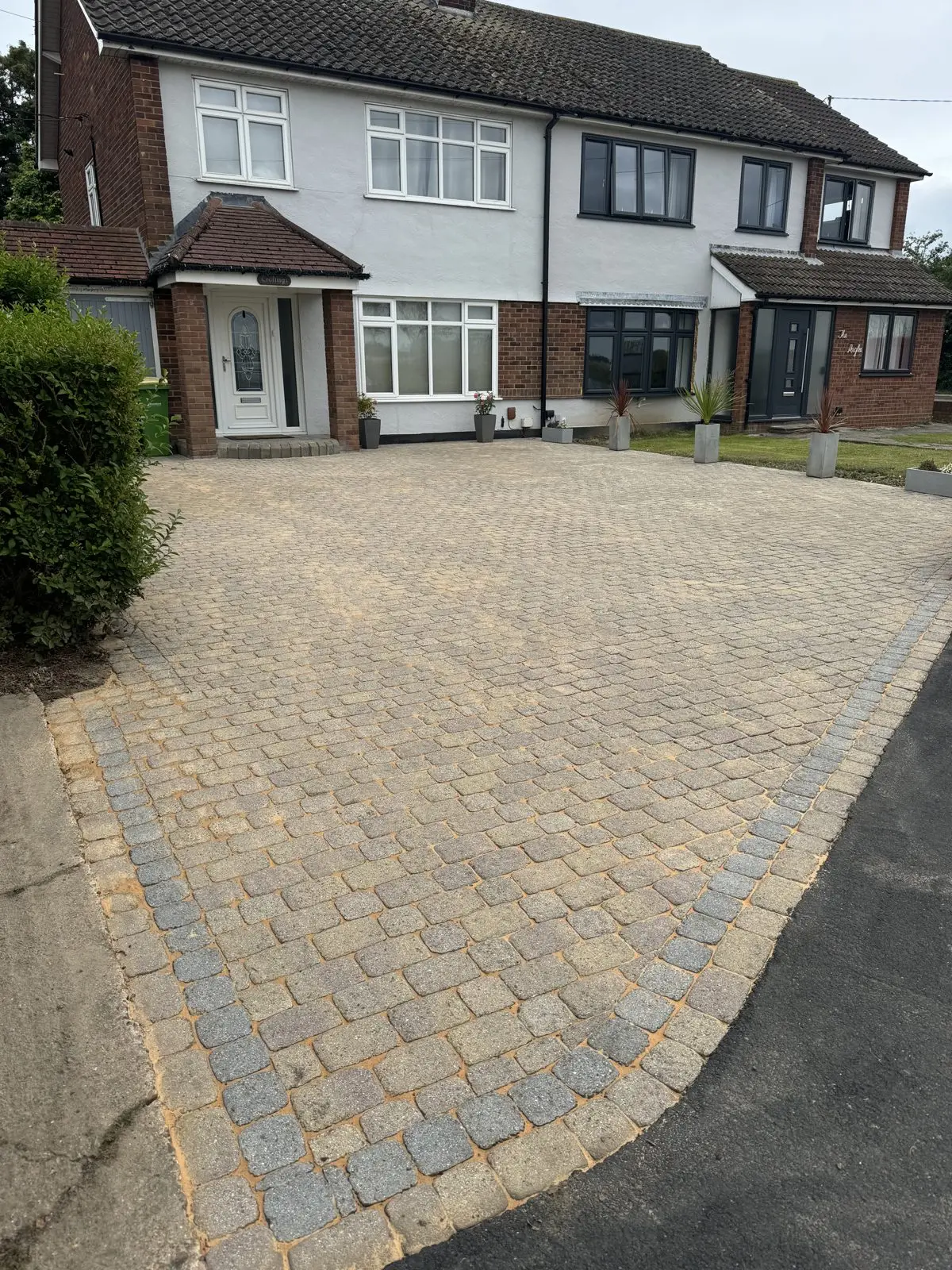 Tan block paving driveway, clean and evenly toned, Essex