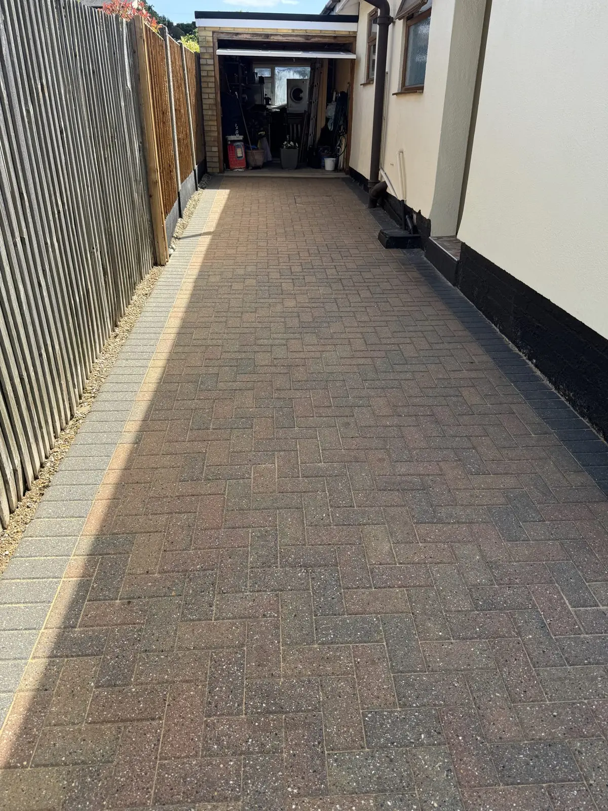 The same block paving driveway after cleaning, moss removed and colour restored