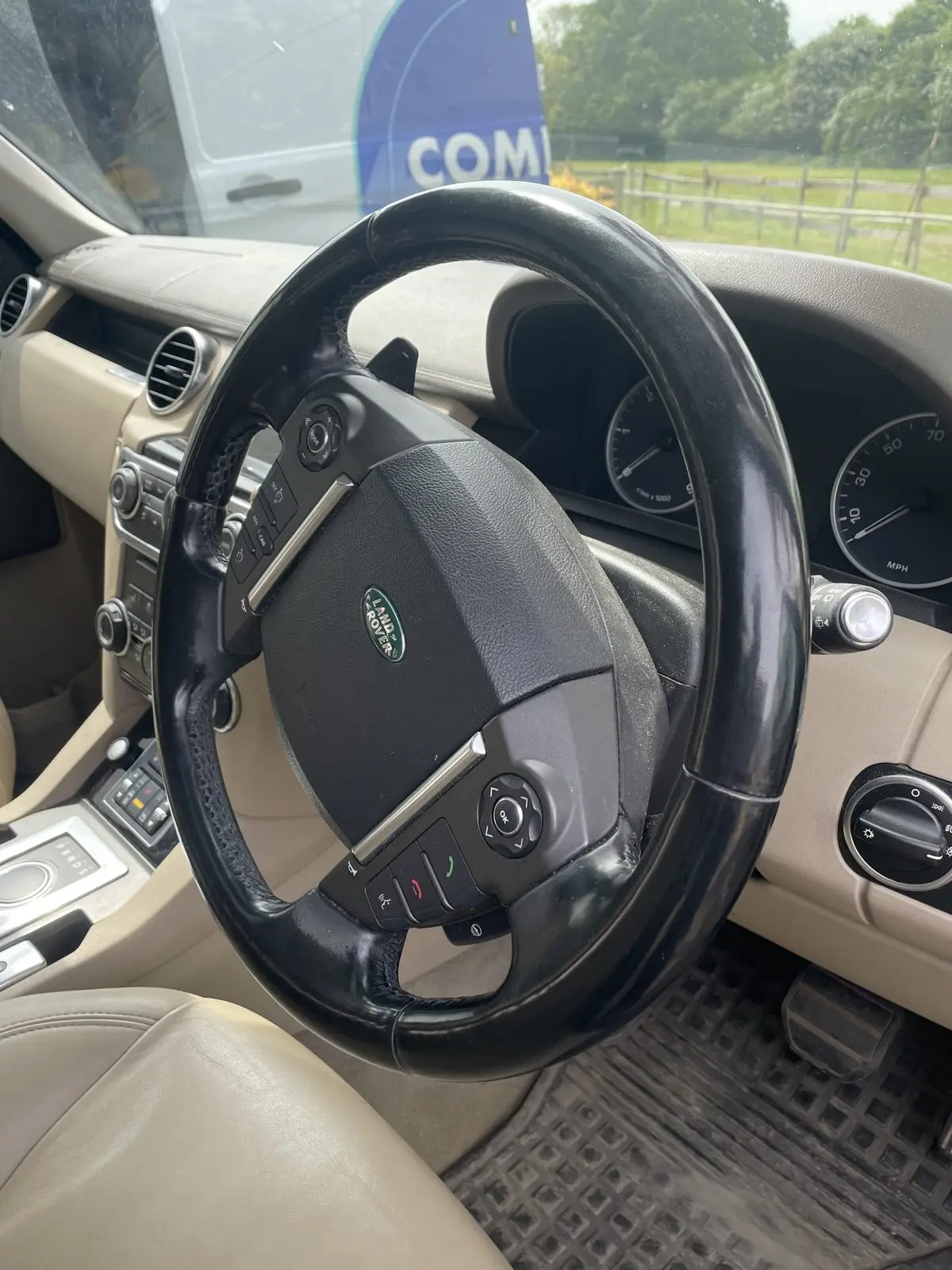 Range Rover dashboard before cleaning, dusty with grime in the trim