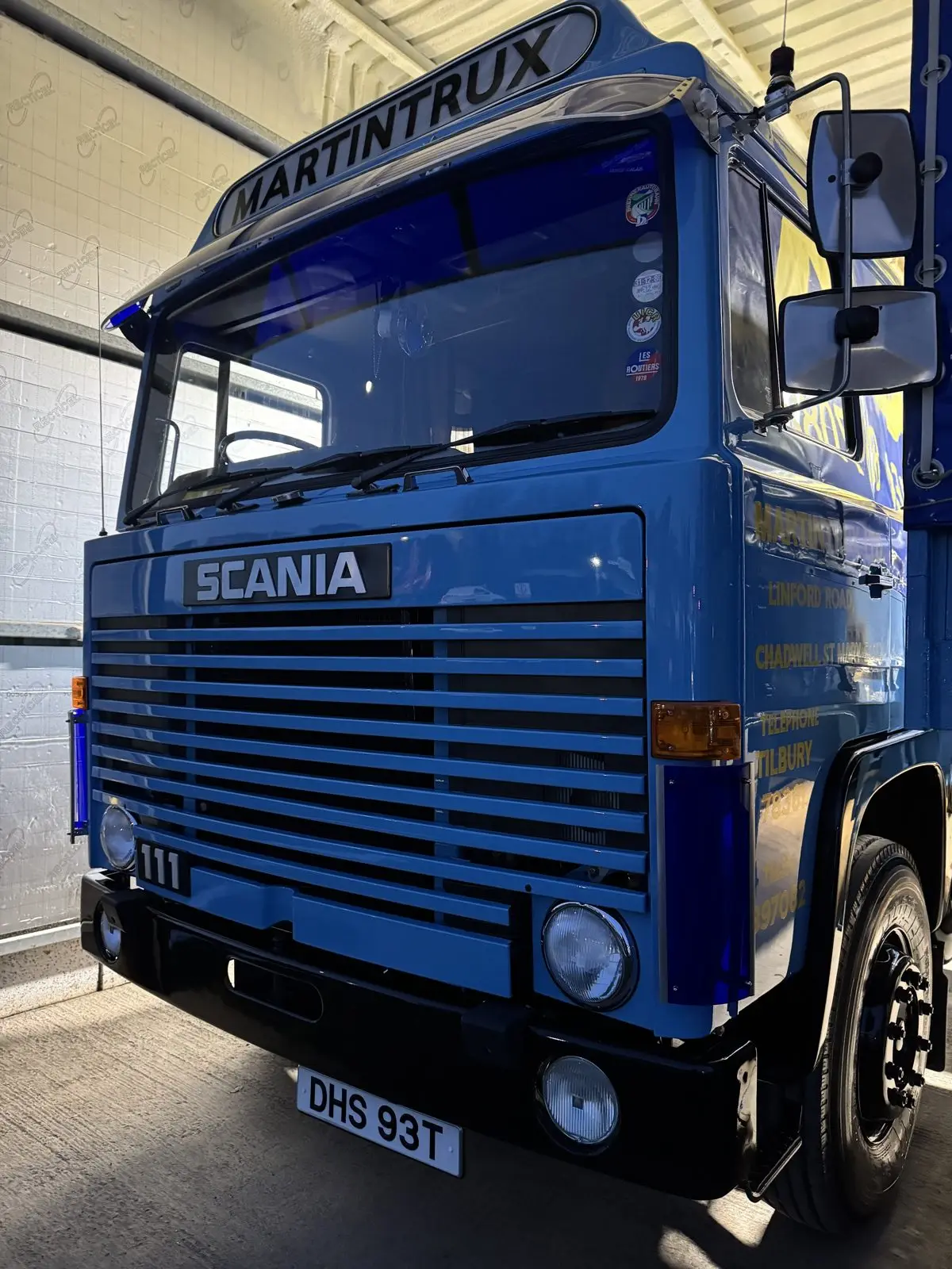 Restored blue Scania lorry gleaming after a full HGV valet in Essex