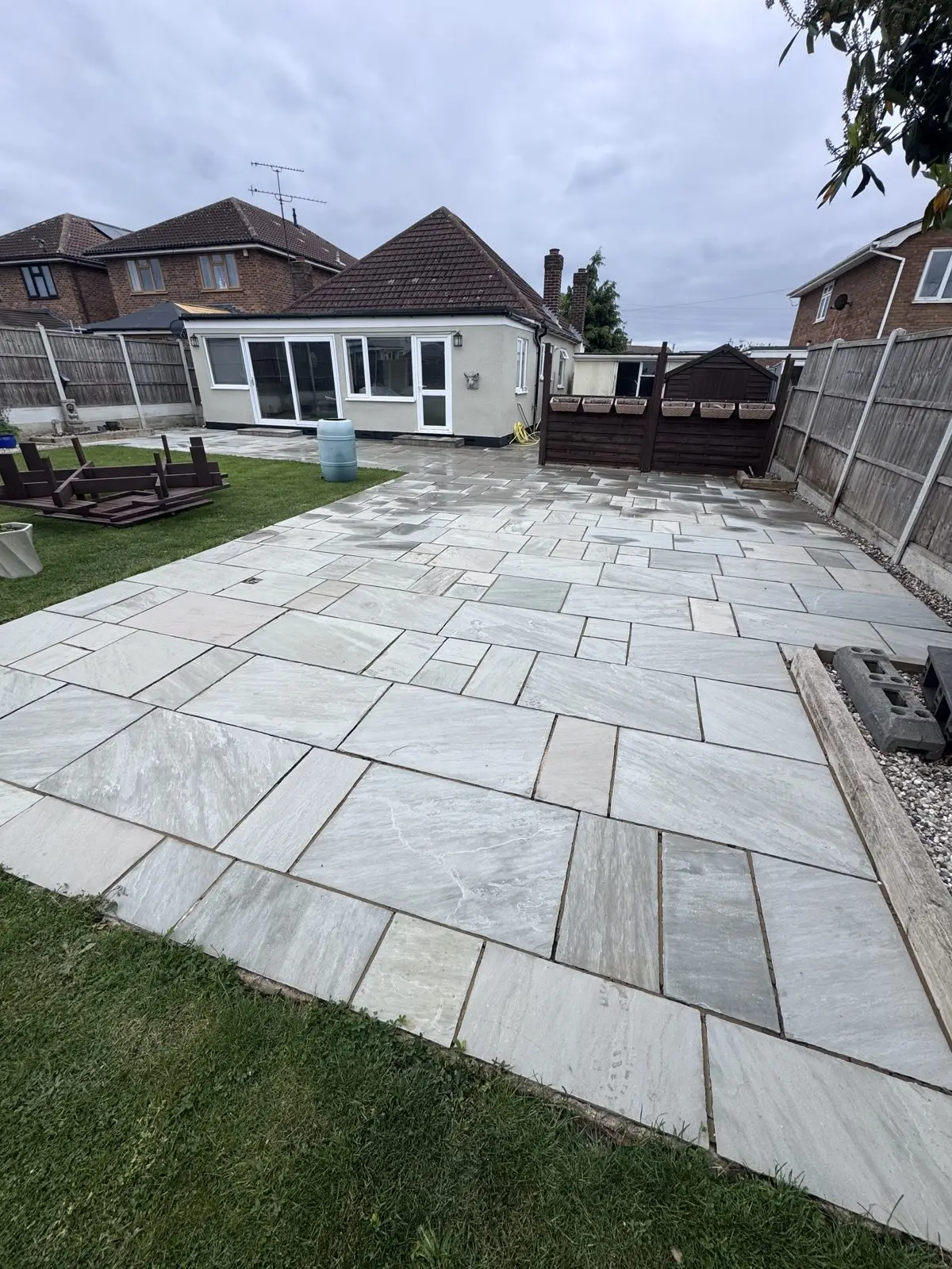 The same Indian sandstone patio after cleaning, restored and bright