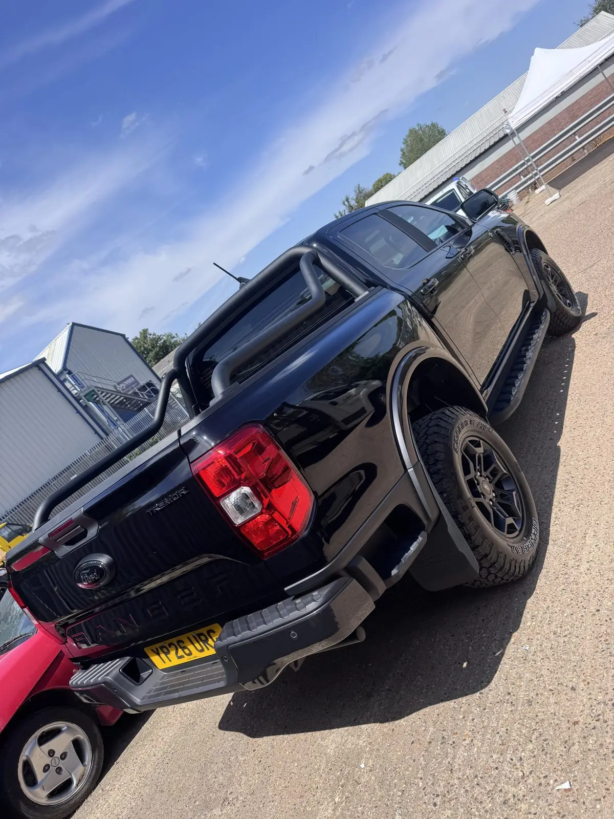 Black pickup truck with a ceramic-coated, mirror-like finish, Essex