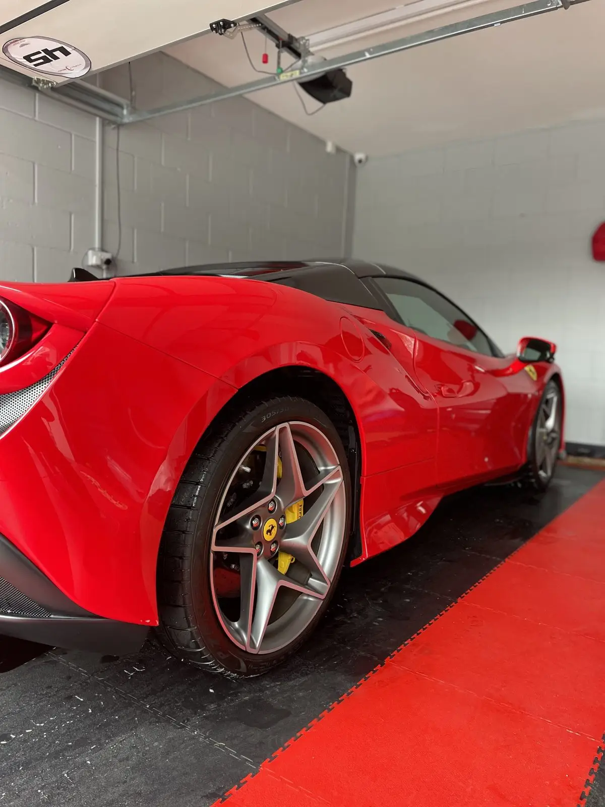 Ferrari paintwork with deep reflections after detailing, Essex