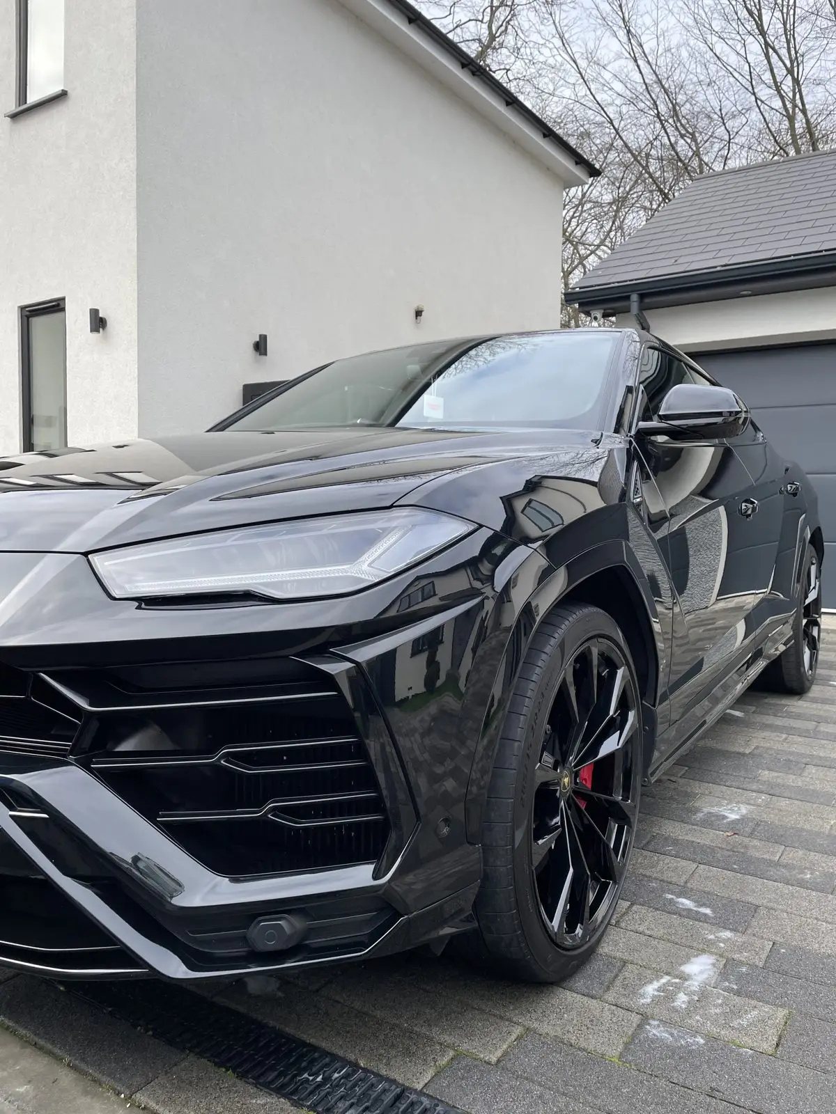 Black Lamborghini Urus with a ceramic-coated gloss finish, Essex