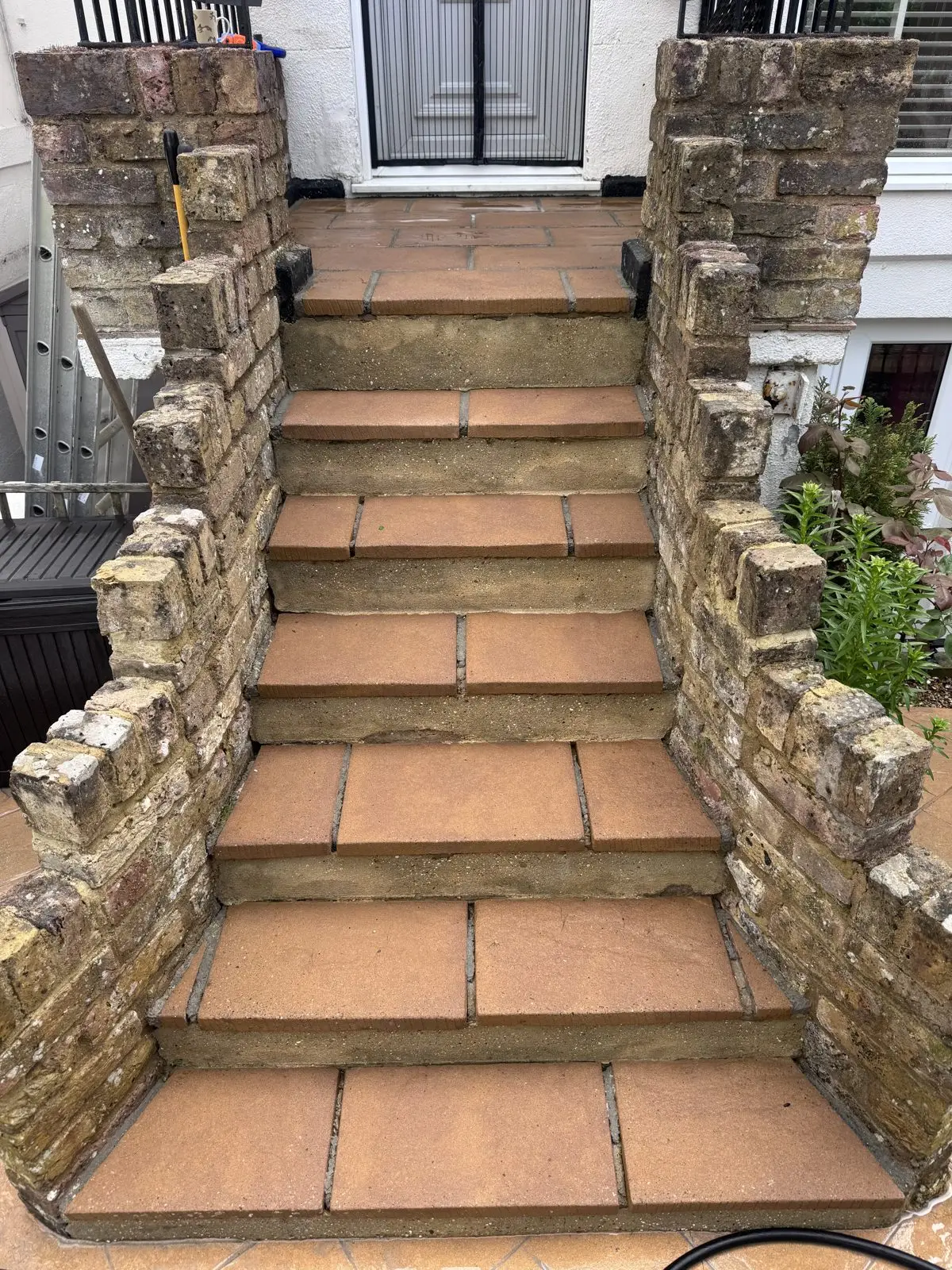 The same stone garden steps after cleaning, safe and clean